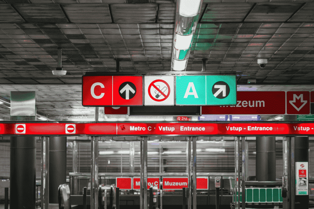 Prague metro station signs showing Line A and Line C at Muzeum station