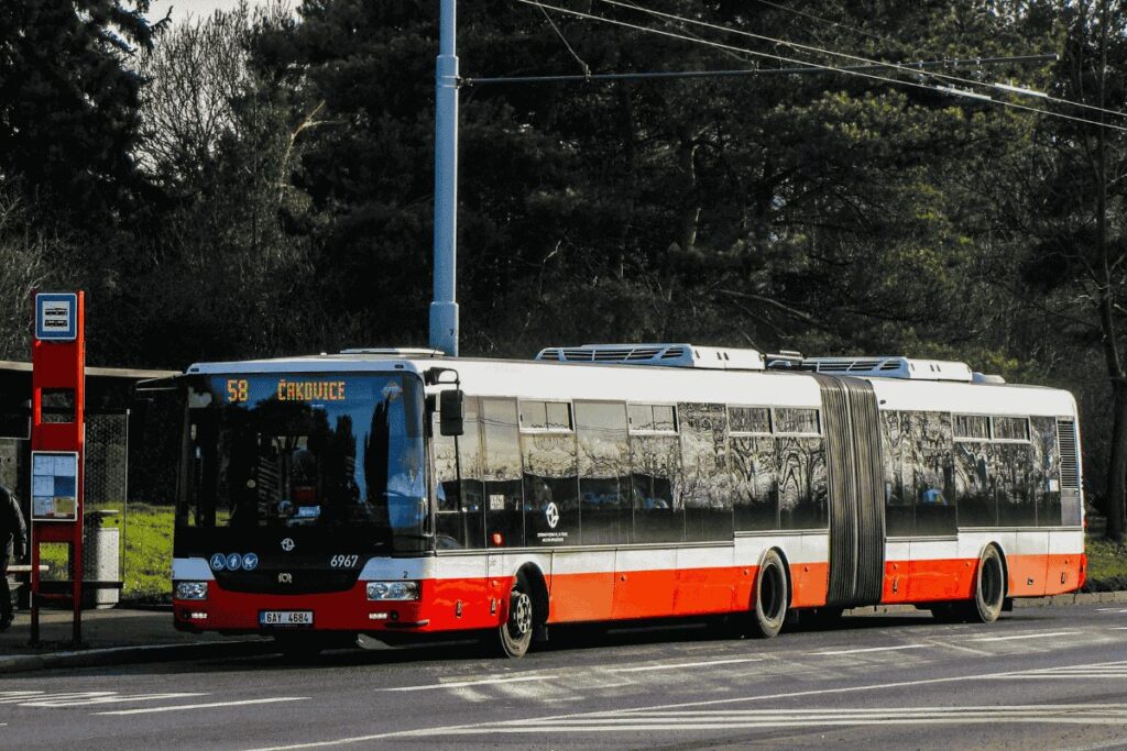 Prague public transport bus number 58 stopped at a bus stop in an outer district