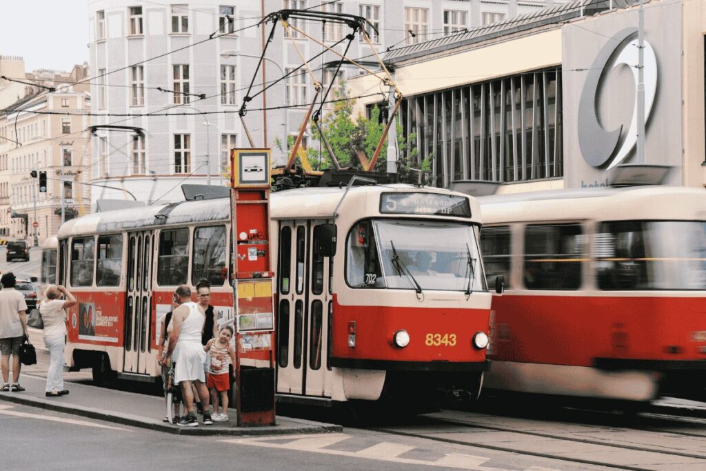 Prague tram stopping to pick up passengers in the city