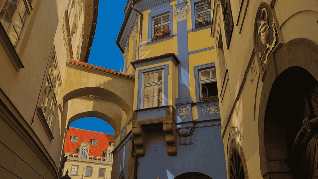 Colorful historic buildings and arches in Prague representing student housing or accommodation in the Czech Republic.