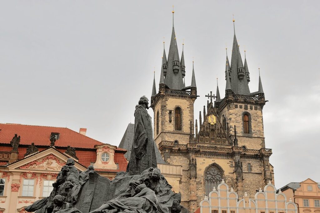 Jan Hus Monument in Old Town Square with Church of Our Lady before Týn in the background, Prague