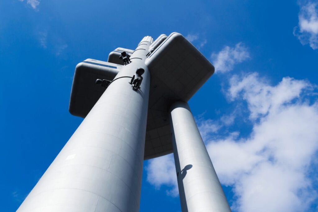 David Černý’s faceless baby sculptures climbing the Žižkov TV Tower in Prague