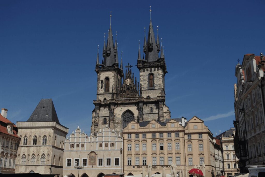 Gothic spires of Church of Our Lady before Týn rising above Old Town Square