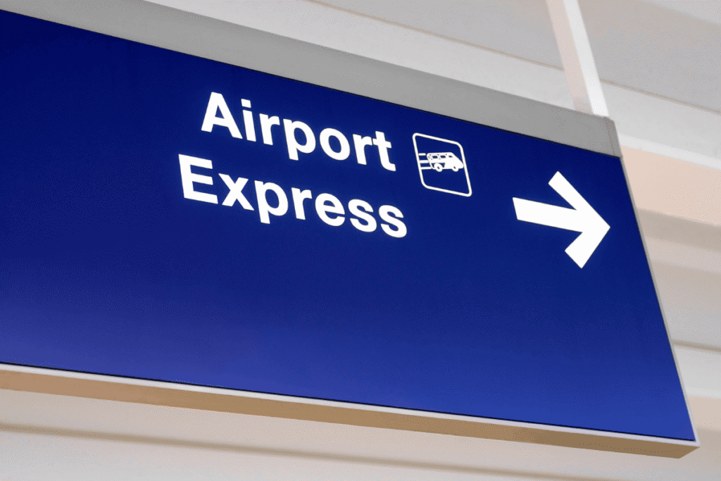 Blue Airport Express directional sign Airport